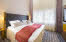 Copyright: Tord-Erik Andresen Soverom med dobbeltseng i Junior Suite, Scandic Holmenkollen Park